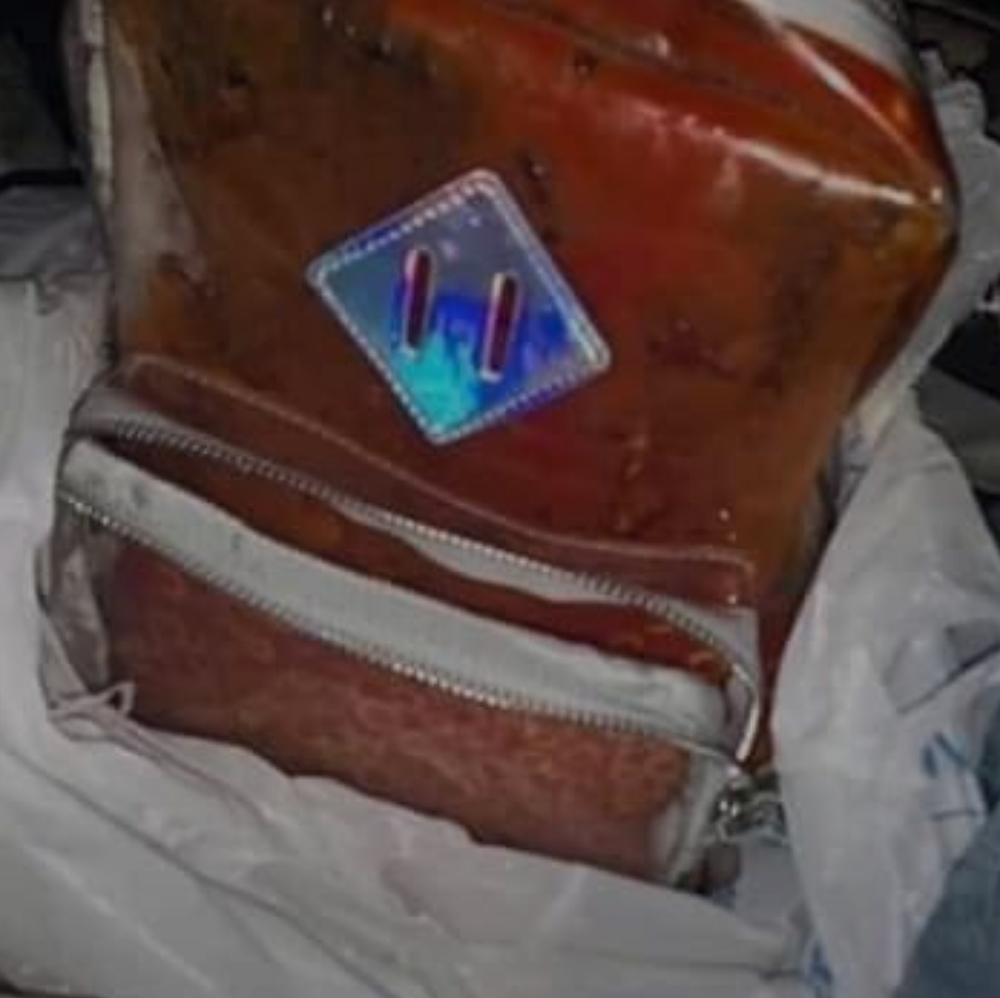 Backpack filled with spaghettios